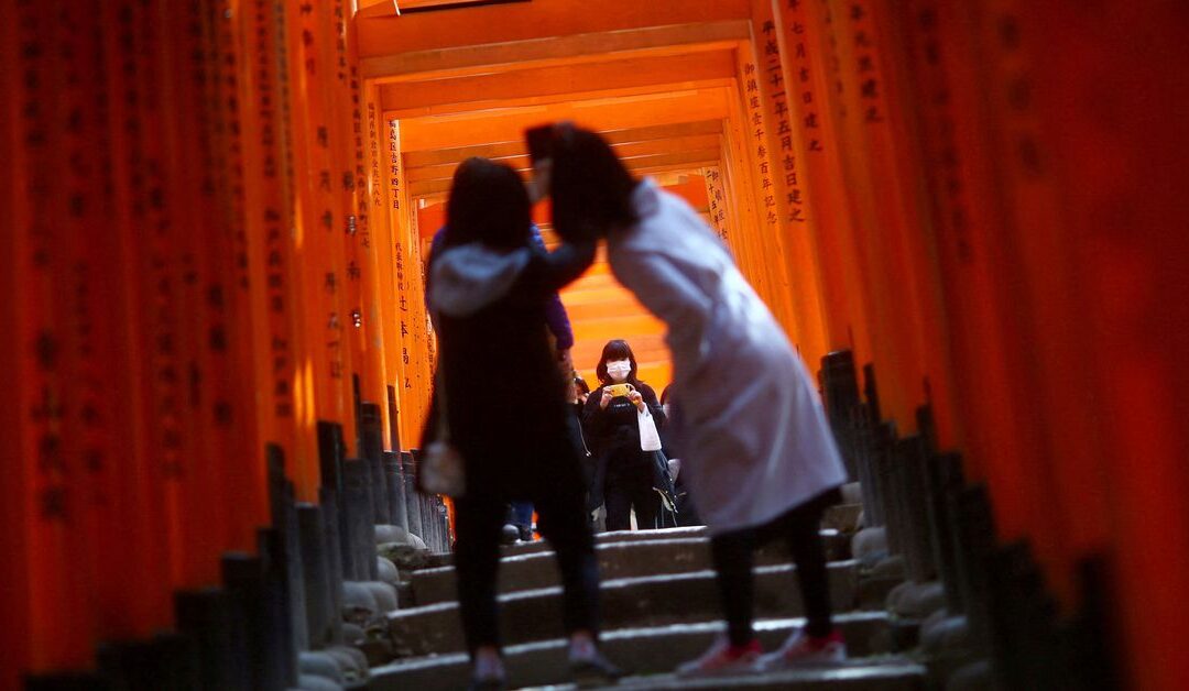Japan to open to tourists after two years but only with masks, insurance, guides